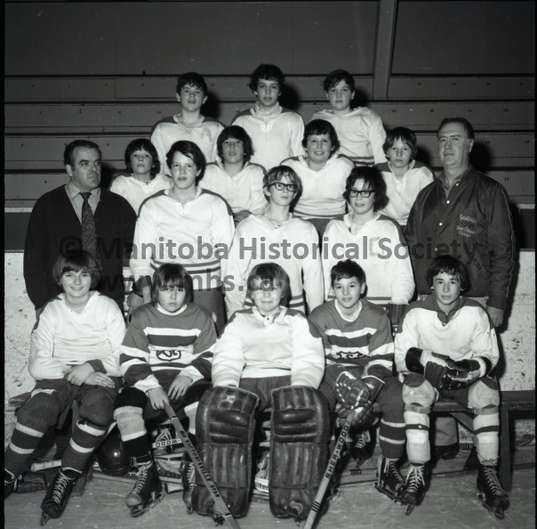(Vopni) March 24/73 MINOR HOCKEY
SOUTHSIDE WINS CITY PEE WEE TITLE
Pee Wee winners| South Side Pee Wees won the City championship for the 1972-73 season by defeating North Side on Saturday. The players on the winning team include front row from the left Brad Barrett, Travis Marszlek, Ian Muir, Leonard Bakuska. Second row – Assistant coach Kelly Griffin, Philip Carpenter, Bradley Milgaard, Brain Smedegaard, and and coach Foss Garrioch. Third row – Dale Morisseau, Jeff Sing, Cal Spratt and Daryll Philips. Back row – Billy Garrioch, Scott Giffin and Kelly McDermid. Missing from the picture – John Swain, Ross Miller, Eric Balch and Colin Scheidle.
11333b.jpg