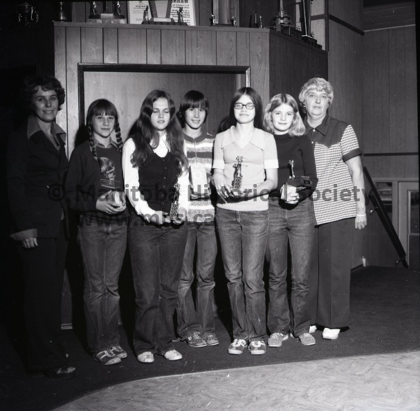 Tashiro, Sept.26/74, Jr. Girls Golf
JR. Girls Golf Wind-Up
Junior Girls Champion: Linda Yablonski receives the Collier trophy from the donor, Mrs. Joyce Collier, for winning the junior girls’ golf club championship for the second straight year. The presentation was made recently at the club winners’ party.
Junior girls’ golf winners: Winners of the minor awards in the junior girls’ golf club playoff, starting from the second left are Julie Lamb, Patti Blenkarn, Marjorie Weday, Margaret Allen, and Kim Klassen. On the left is assistant chairman Helen Moran and on the right is chairman Pollyann Weday.
Y-2014 (2).jpg