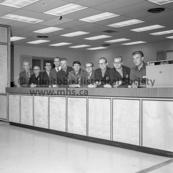 Photographer: Tashiro
October 26-27, 1971
United Way
United Way gets help from Hydro - Rebekahs
Manitoba Hydro employees pledged a total of $600 to the Portage United Way. The pledge was met with an equal amount from the Hydro itself, making a total of $1,200. Hydro employees from the left are Jack Fraser, Fred Armstrong, Alf Iverson, Bob Smart, Jack Archibald, Dennis Zwarich, Dennis Kitson, John Ginter, Hector Winton and Alister Scott. Several are missing from the picture VP-1-00773-001.jpg