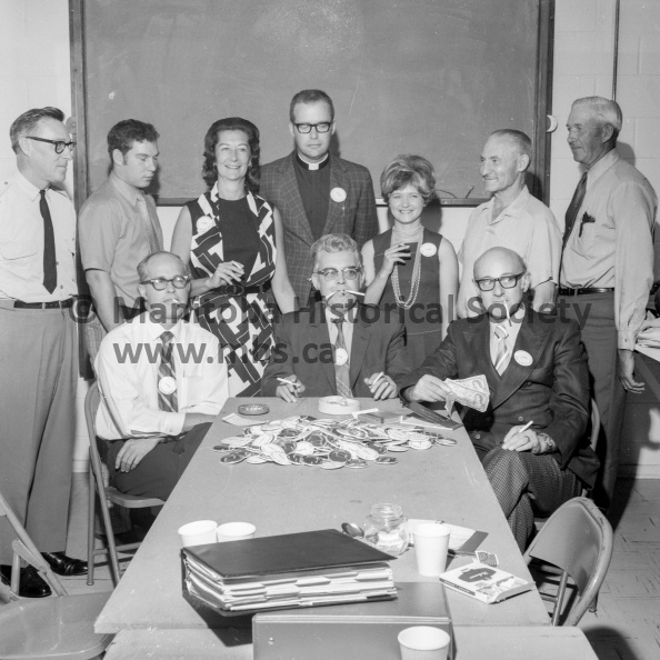 Photographer: Tashiro
September 7, 1971
United Way
Portage United Way - Give up smoking campaign start
Giving up smoking and helping the United Way -- At front, from the left, Bruce Miller, Elly Brooker and “I’m giving up smoking” chairman Mel Narvey. Standing are, from the left, Sgt. Tom Ellis, Andy Fletcher, Mark Clark, Rev. Patrick Lee, Mrs. Sharon Bruinooge, Hank Lamoureux and Leonard Smith. Tom Ellis, Andy Fletcher, Lamoureux and Smith are the non-smokers smugly looking on at their not-so-fortunate colleagues from the Portage United Way board of directors. VP-1-00784-001.jpg