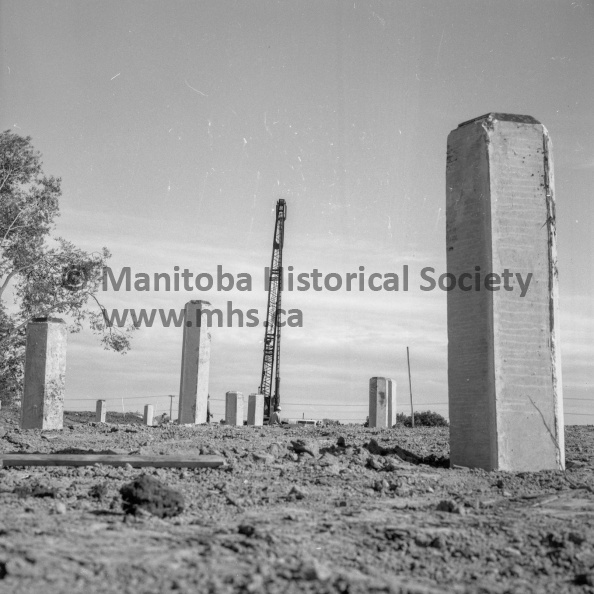Photographer: Tashiro
September 17, 1968
Education
West End School Construction - Pile Driving Ahead of Schedule
Stonehenge maybe? Pillars continue to be driven into place in the city's west end, location of the city's new elementary school. Pile driving operations are expected to be completed in a week, then the real work begins. According to a company spokesman on the site, work is ahead of schedule. VP-1-00355-005.jpg