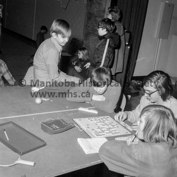 Photographer: Vopni
February 10, 1973
A.M.H.S.
A.M.H.S. -- Annual wake-athon
Successful wake-a-thon
No, these boys aren’t playing scrabble to cure a bad case of insomnia. Quite, the contrary, they are playing it to keep awake. When this picture was taken, the group had passed the 24-hour mark in the Arthur Meighen wake-a-thon and were still going strong. Gerry Denslow, pen in mouth, contemplates the board while Gary Bullock makes his move. The third player, Bob Wood, just stares at his board. Or is he sleeping? VP-1-00530-003.jpg