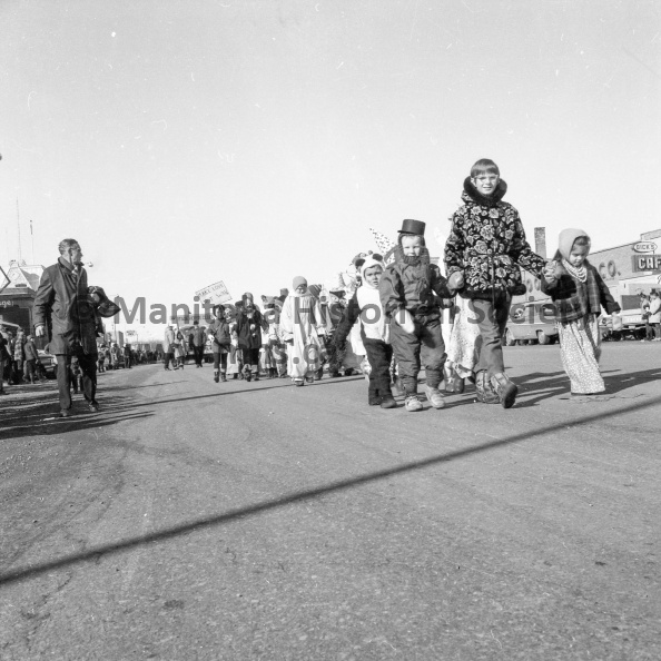 Photographer: Tashiro
March 2, 3, 1968
Wint. Fun Festival
Fun festival second and final day
Costumed kiddies lent greatly to the success of this year's Winter Fun Festival. Following the judging of costumes, the children lined up and joined in the Fun Festival parade down Saskatchewan Avenue. This shot only shows a small number of the many youngsters who dressed up the parade. VP-1-00504-002.jpg