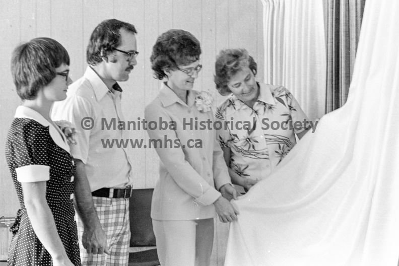 Photographer: Tashiro
August 15, 1975
D D Draperies
D D Draperies officially opened by mayor
Drapery sample
Portage mayor Karen Devine, right, looks over a sample shortly after declaring the DD Draperies, Lorne Ave. at 2nd St. N.W. officially open Friday afternoon by cutting the ceremonial ribbon. Next to the mayor is Mrs. Dee Jansens, proprietor of the new venture which specializes in custom draperies. Also in the photo are Mrs. Helen Sequin, left, who is the receptionist and Dick Janssens. VP-2-00049-001.jpg