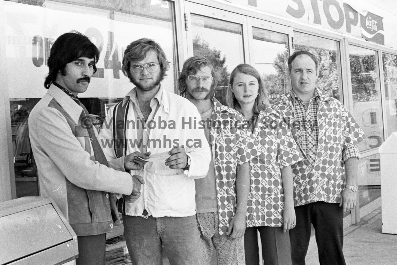Photographer: Tashiro
September 16, 1975
Seven-Eleven Stores
Seven-Eleven stores (west) contest winner and cheque
Mr. Alf Mehkary of 7-Eleven stores is pictured above presenting Harry Tully of Portage a cheque for $150.00 Behind Mr. Tully are Keith Williams and Wendy Booth along with store manager Gary Sears. VP-2-00190-001.jpg